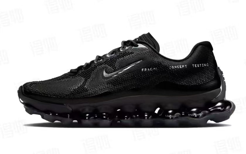 Black Nike Air Max Scorpion-style shoe with a mesh-patterned upper, metallic-look Swoosh, and sculpted sole