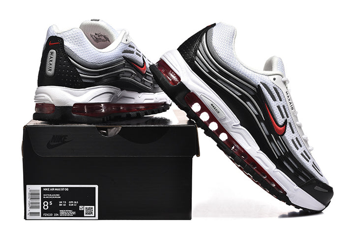 Nike Air Max 97 OG sneakers displayed on a box; the box label shows a sample size.