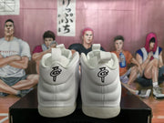 Rear view showing padded heel sections, pull tabs and black embroidered heel logos.
