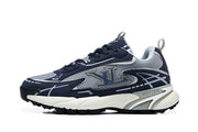 Side profile showing layered overlays and sculpted midsole