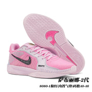 Pink Nike Sabrina 2 basketball shoes with a light pink outsole and dark Swoosh detail; image text identifies style 8080-1 and sizes 40-46.