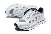 Pair of white and grey Cloudtilt Remix lace-up sneakers in angled views.