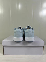 Rear view showing matching blue-grey heel panels and embossed winged basketball logos.