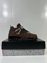 Side profile of the brown and black mid-top sneaker displayed on a speckled shoe box.