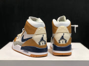 Rear view of the pair showing the heel tabs, Jordan graphics, navy heel sections, and gum-colored outsoles.