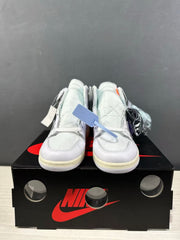 Front view of the pair showing padded tongues, white toe boxes, and cream-colored midsoles.