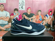 Side profile of a navy blue sneaker with a white Swoosh, layered heel, and white outsole.