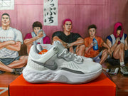 Side view showing the Swoosh, perforated panels, and textured sole