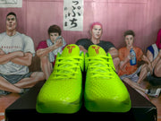 Front view of bright green Nike KD basketball sneakers showing the textured uppers, laces, and tongue logos.
