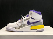 Side profile showing the high-top collar, purple branding, grey heel panel, yellow midsole section, and visible air unit.
