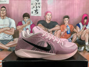 Side view of a pink Nike basketball shoe with black Swoosh logo and patterned side panels