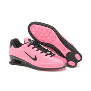 Pink and black Nike Shox Z R2 sneakers with the outsole visible