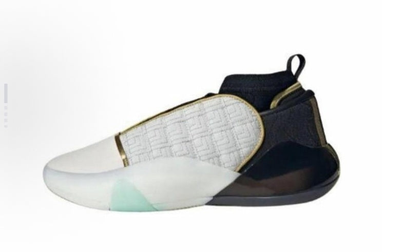 White and black high-top sneaker with a patterned side panel, rear pull tab and translucent outsole detail.