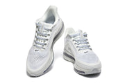 Top and front views of the Nike Pegasus Premium shoes showing the laces and perforated panels.