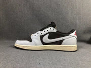 Side profile of a sneaker showing the white and black upper, brown Swoosh, cream midsole, and black outsole.