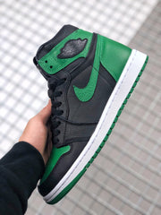 Angled side view showing the green Swoosh, black panels, green heel, and white midsole.
