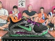 Side view showing the black graphic upper, green Nike Swoosh, purple accent, and green outsole.