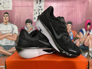 Pair of black Nike running shoes shown from side and top angles
