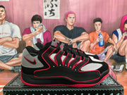 Side view of a black, white, and red Nike basketball sneaker showing layered red-edged detailing and a visible swoosh.