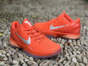 Angled product view showing one foreground sneaker and one sneaker in the background.