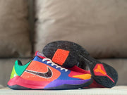 Side and outsole view of the multicolor basketball shoes