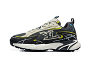 Side profile of a black and grey chunky sneaker with cream overlays, yellow trim, and blue accents.