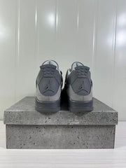 Rear view of the pair showing the tonal Jordan heel logos and layered grey heel panels.