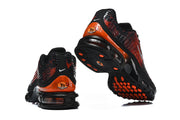Nike sneakers showing the heel, outsole, and visible cushioning units.