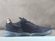 Side profile showing the upper, lace closure, and outsole of a Nike Kobe 8 shoe
