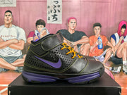 Side profile of a black high-top basketball sneaker with perforated panels, a purple Swoosh, yellow stitching, and a purple midsole.