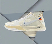 Cream and white mid-top basketball shoe with an oversized white side swoosh, blue and orange heel accents, and visible AIR lettering.