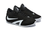 Pair of black lace-up basketball shoes with white and silver side detailing shown from a front three-quarter angle.