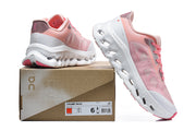 Pink Cloudtilt Remix sneakers with the shoe box label visible