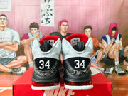 Rear view showing the number 34 on the heels and red-lined collars.