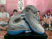 Angled view highlighting the perforated side panel, high-top collar, and contrasting blue details