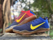 Pair of Kobe 11 sneakers showing blue and red color variations with yellow Swooshes