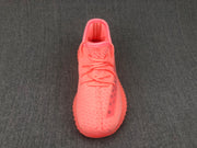 Top-down view showing the pink knit upper, tonal laces, and rounded toe.