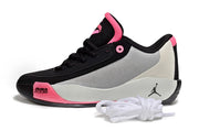 Black, pink and light gray Luka.77 basketball sneaker shown from the side with white spare laces.
