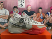 Side view of Nike Ja 2 shoe with black Swoosh and red details