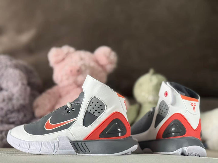 Pair of gray, white, and red high-top kids' sneakers shown from the rear three-quarter angle.