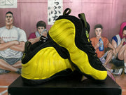Yellow and black high-top sneakers shown from the side and rear