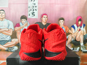 Rear view of the red basketball shoes with black heel accents