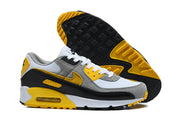Nike Air Max 90 sneakers shown from the side and with the outsole visible.