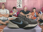 Side view of a gray Nike sneaker showing the blue Swoosh, layered side panels, contrasting midsole, and visible Nike tag.