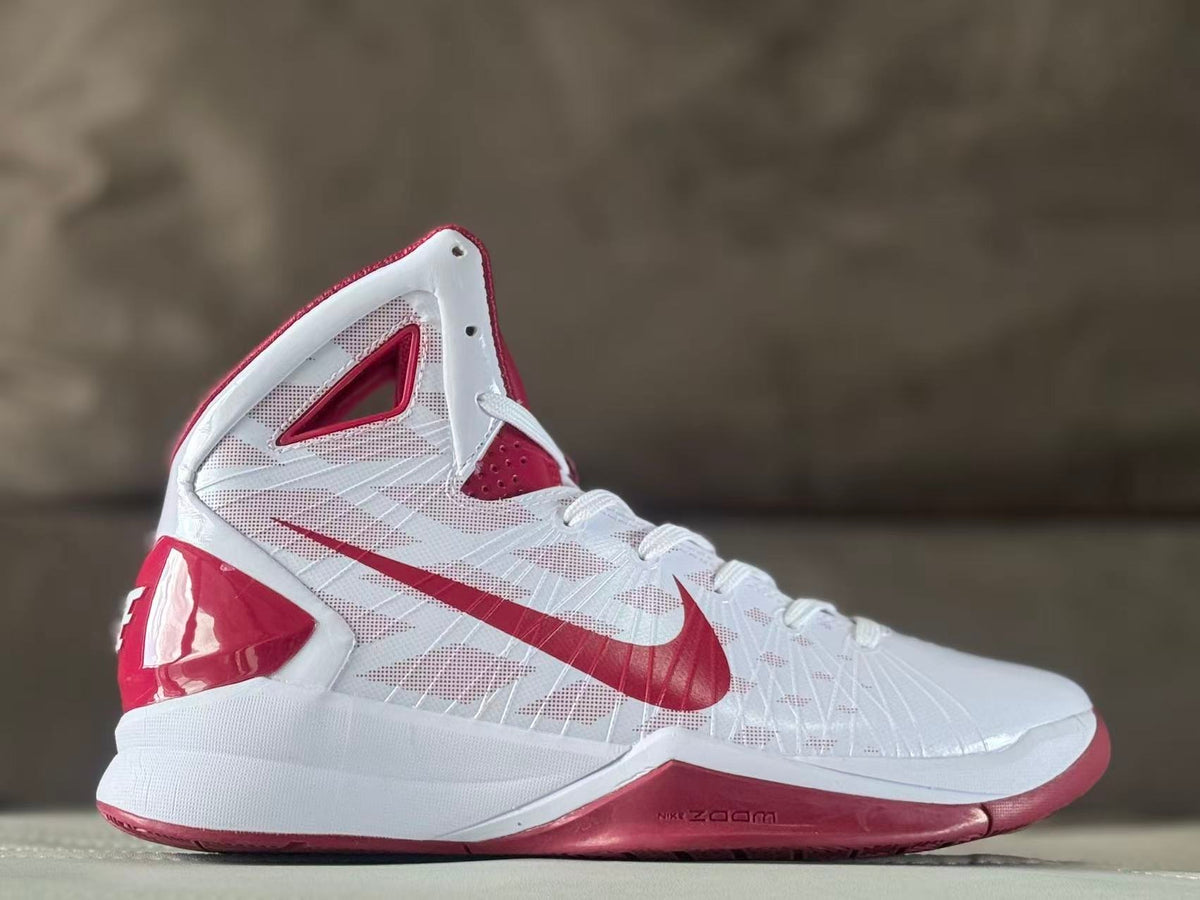 Side view of a white and red Nike Kobe 7 high-top basketball shoe.