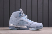 Front-side view of the icy blue Jordan Air Jordan 5 Retro high-top sneaker showing the toe box, laces, and midsole cushioning window.