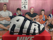 Side view showing oversized AIR lettering, perforated panels, and visible cushioning.