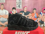 Side profile of a black Nike sneaker showing the large AIR lettering, layered panels, and thick outsole.