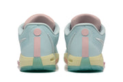 Rear view of the pastel blue shoes with pink heel accents and multicolor soles.