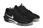Pair of black Nike G.T. Cut 3 basketball shoes shown at an angle.